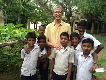 Theosophical Society - Tim Boyd with seventh- level students at the Olcott Memorial High School.